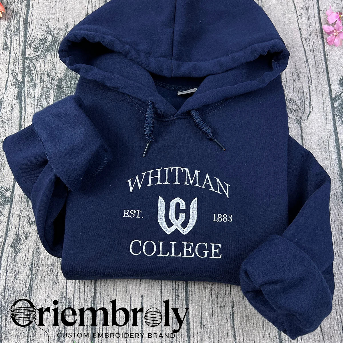 Beige custom hoodie featuring red varsity-style lettering
