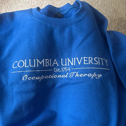 College name embroidered on crewneck sweatshirt
